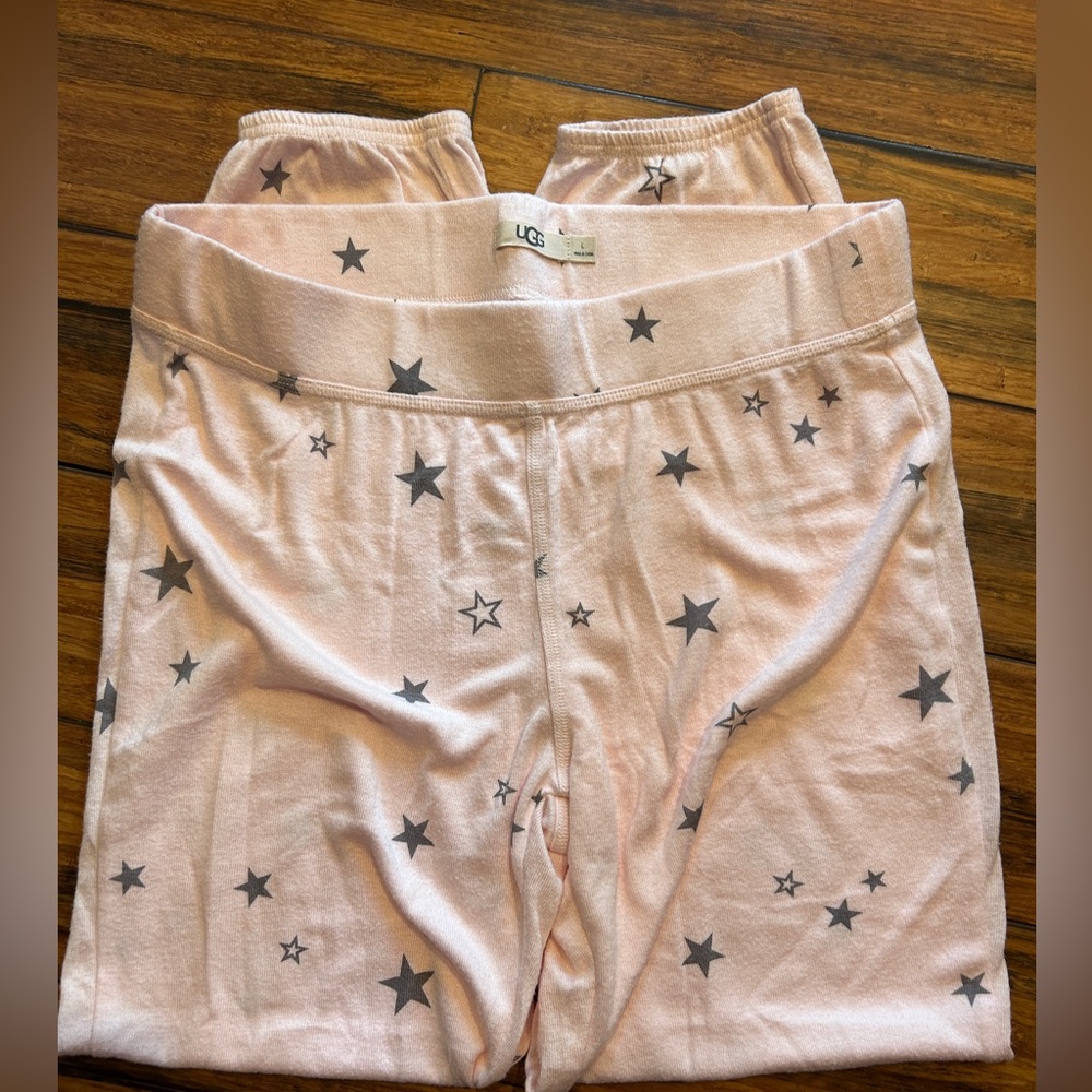 UGG women’s long sleeve pajamas. Light pink with gray stars. Size L.